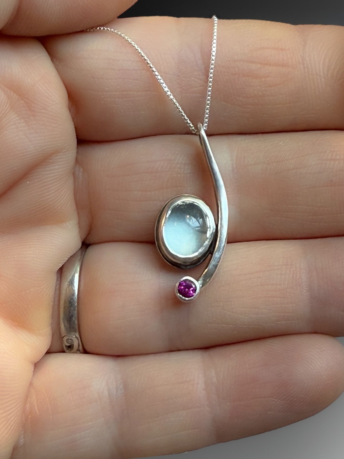Crescent Curve Necklace with Sky Blue Topaz and Rhodolite Garnet