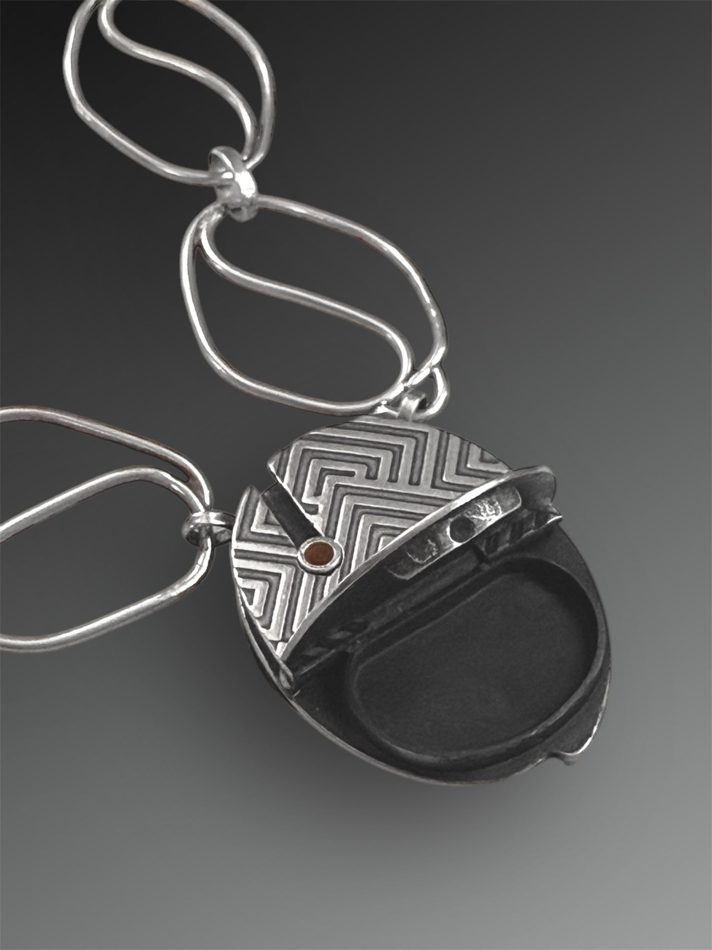 Hollow Form Hidden Compartment Necklace with Handmade Chain and Garnet Key Clasp
