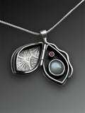 Valentine Story Locket with Laguna Lace Agate, Gray Moonstone, and Garnet