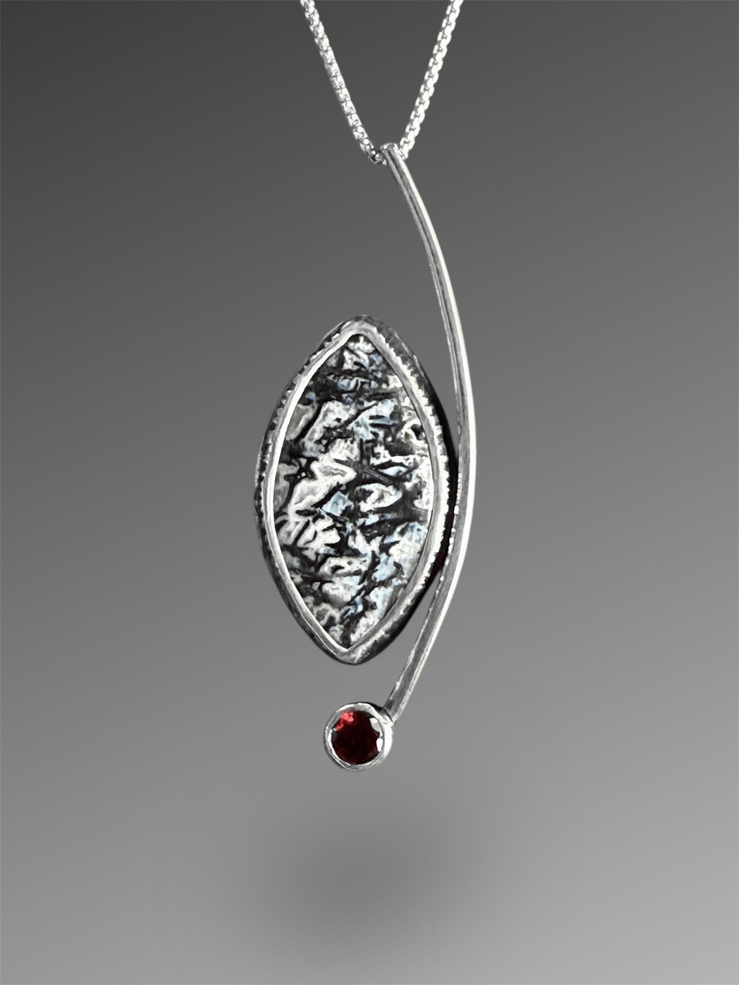 Crescent Curve Necklace with Fossilized Palm and Garnet